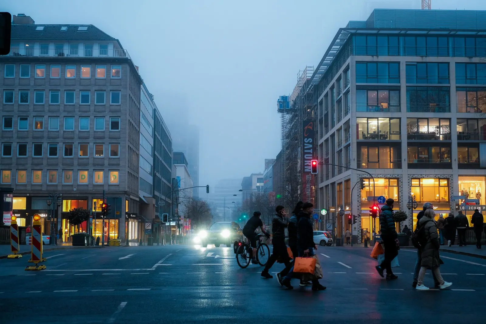 Office workers leaving a city office district at dusk